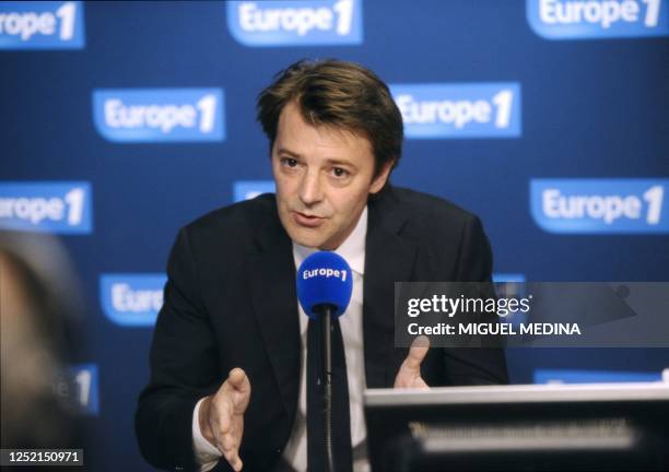 New French Finance Minister Francois Baroin speaks in a studio of French Europe 1 radio on July 6, 2011 in Paris during his first interview since his...