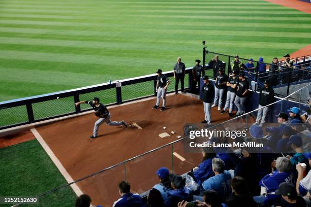 April 24 - Fans watch as Chicago White Sox starting pitcher Lance Lynn warms up in the bullpen ahead of the game against the Toronto Blue Jays in...