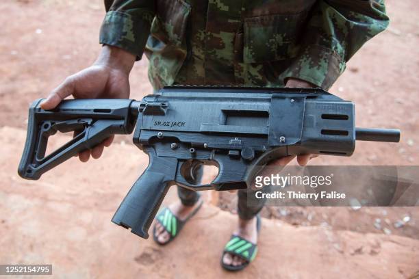 The Karenni Nationalities Defence Force produces part of its own weaponery with modern technology and other do-it-yourself tools. Here, a rifle gun...