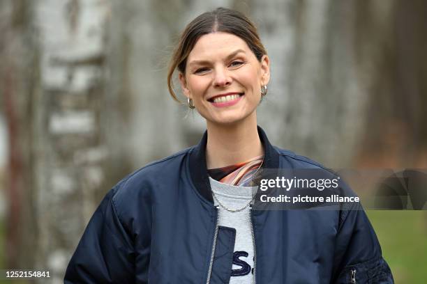 April 2023, Brandenburg, Rheinsberg: Eva Briegel, singer from the band Juli, has her picture taken at a photo session at Landhaus Siebenwasser. The...