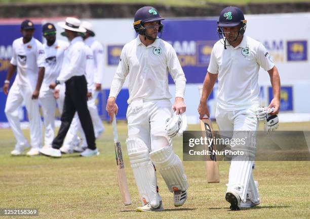 Curtis Campher and Andy McBrine of Ireland rleaves the field for the lunch break during the second day of the second Test match between Sri Lanka and...