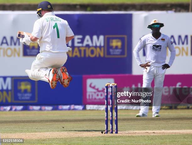 Paul Stirling of Ireland jumps during the second day of the second Test match between Sri Lanka and Ireland at the Galle International Cricket...