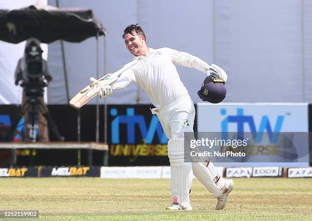 Curtis Campher of Ireland celebrates after scoring a century during the second day of the second Test match between Sri Lanka and Ireland at the...