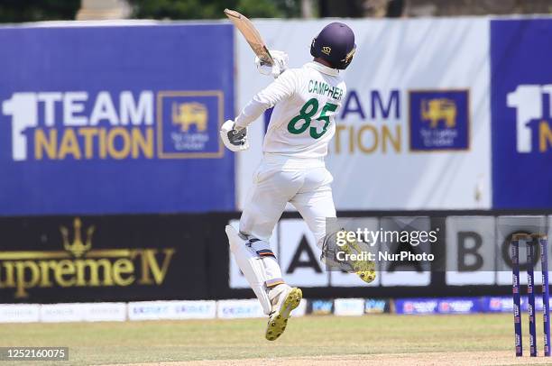 Curtis Campher of Ireland celebrates after scoring a century during the second day of the second Test match between Sri Lanka and Ireland at the...