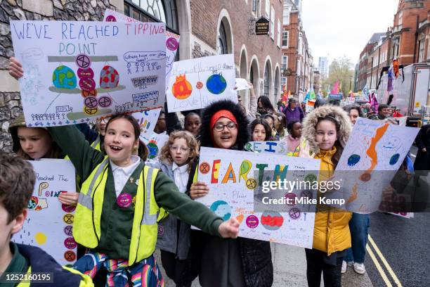 Children from Stroud Green School join protesters from the environmental group Extinction Rebellion on a 'People's Picket' march, part of 'The Big...