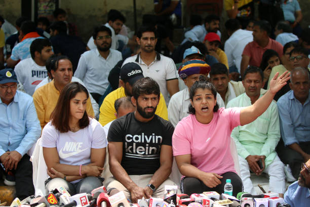 Wrestlers Bajrang Punia, Vinesh Phogat, Sakshi Malik, during a protest against WFI President Brij Bhushan Sharan Singh over different allegations, at...