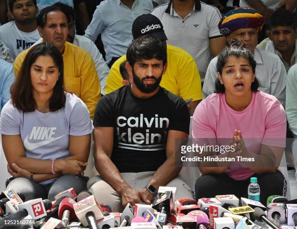 Indian Wrestlers, Vinesh Phogat, Bajrang Punia along with Sakshi Malik addresses media during their protest at Jantar Mantar on April 24, 2023 in New...