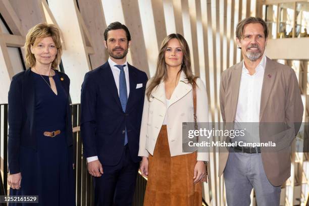 Prince Carl Philip of Sweden and Princess Sofia of Sweden are greeted by director Annika Ostman Wernerson and professor Sven Bolte as they arrive at...