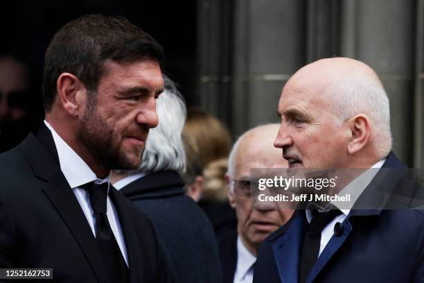 Former boxers Alex Arthur and Barry McGuigan leave the funeral ceremony for Ken Buchanan at St Giles’ Cathedral on April 25, 2023 in Edinburgh,...