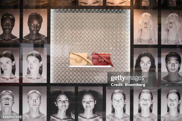 Display of Horsebit 1955 handbags on display in the window of the Gucci luxury clothing boutique, operated by Kering SA, on Rue Royale in central...