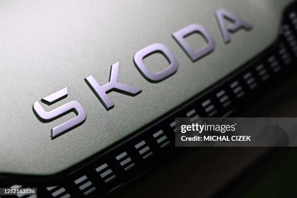 The company's new logo is seen on a Skoda Vision 7S Concept electric car on display during the presentation of the new brand identity of the Czech...