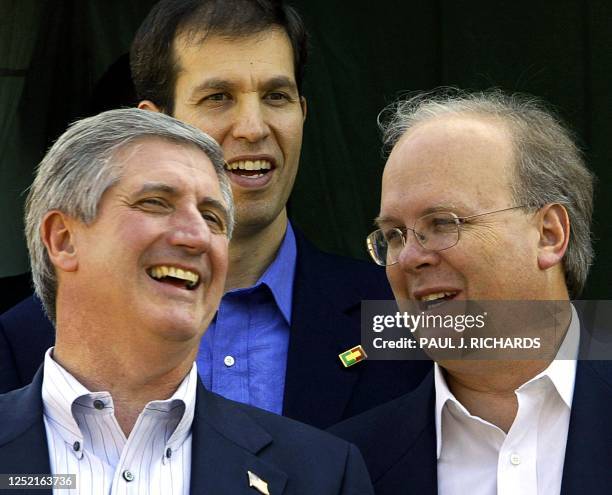 White House Chief of Staff Andrew Card , Campaign Manager Ken Mehlman and White House Senior Advisor Karl Rove speak as they join US President George...