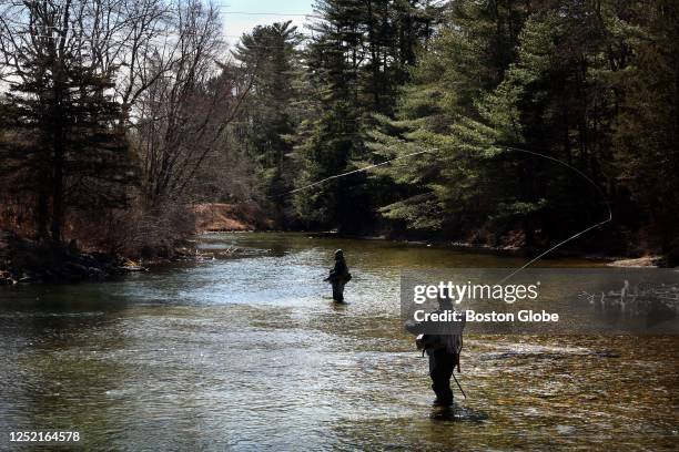Belchertown, MA Fly fisherman take to the water at the Y Pool on the Swift River.
