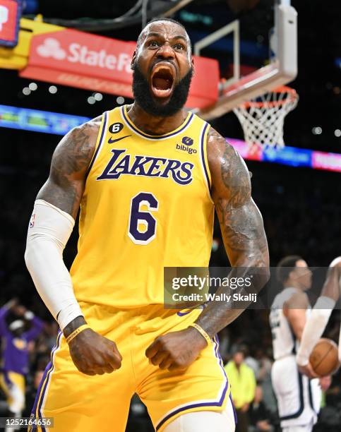 Los Angeles, California April 24, 2023-Lakers LeBron James celebrates his basket after being fouled by a Grizzlie player in overtime in Game 4 of the...