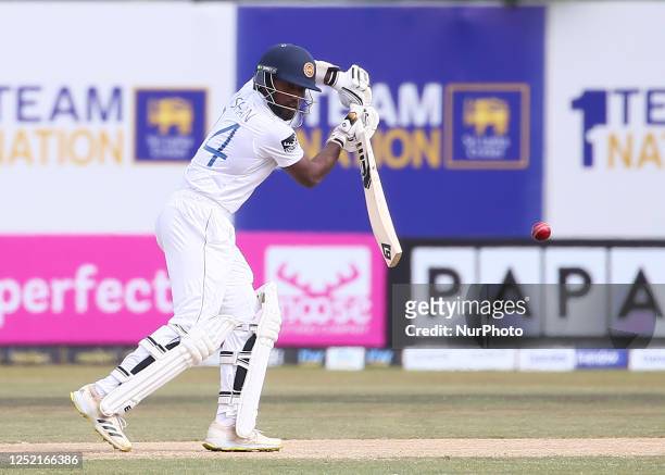 Nishan Madushka of Sri Lanka plays a shot during the second day of the second Test match between Sri Lanka and Ireland at the Galle International...