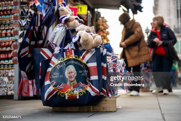 Commemorative tote bags for sale at a souvenir stall ahead of the coronation of King Charles III, in London, UK, on Tuesday, April 25, 2023. When...