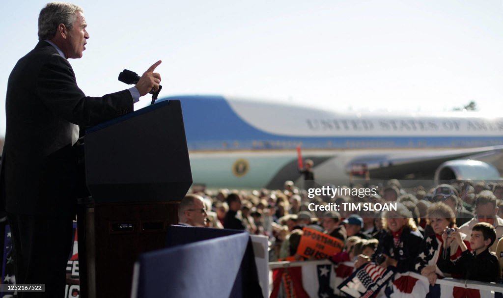 Bush 48 With Air Force One behind him, US President George W. Bush addresses ...