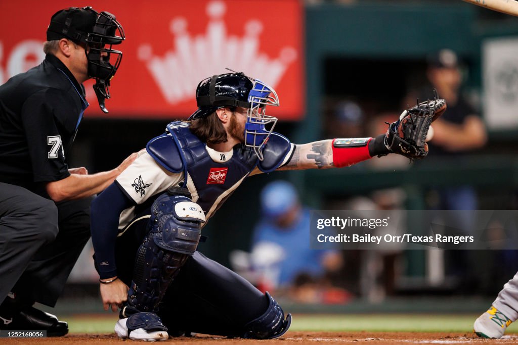 Texas Ranger Heim Jonah Heim of the Texas Rangers catches a pitch during a game against ...
