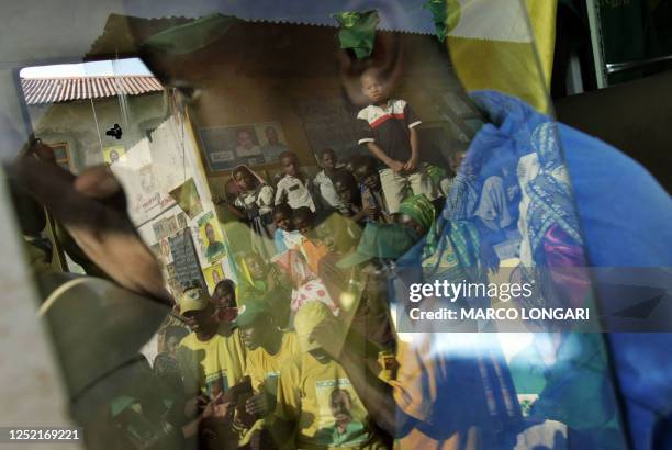 Supporters of Amani Abeid Karume, President of Tanzania's semi-autonomous island of Zanzibar, leave after a rally of the Presidents' Revolutionary...