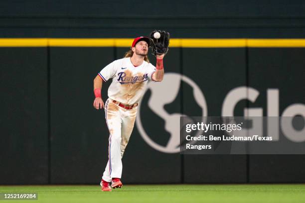 Travis Jankowski of the Texas Rangers catches a fly ball during a game against the Kansas City Royals at Globe Life Field on April 10, 2023 in...