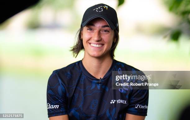 Caroline Garcia of France talks to the media on Day Two of the Mutua Madrid Open at La Caja Magica on April 25, 2023 in Madrid, Spain