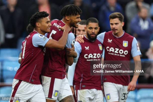 Tyrone Mings of Aston Villa celebrates after scoring a goal to make it 1-0 during the Premier League match between Aston Villa and Fulham FC at Villa...