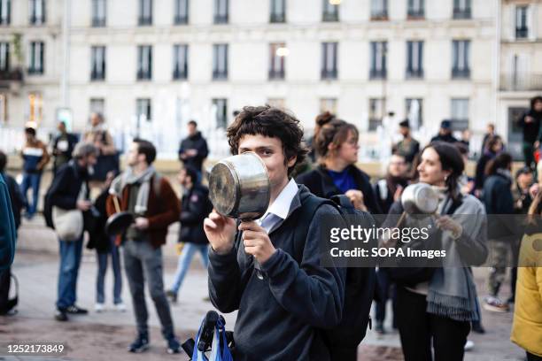 Protester seen banging a sauce pan during the demonstration. A wave of protests took place in several cities of France in front of the Town Halls, to...