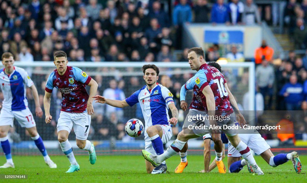 Skbd Rovers Blackburn Rovers' Lewis Travis battles with Burnley's Ashley Barnes ...