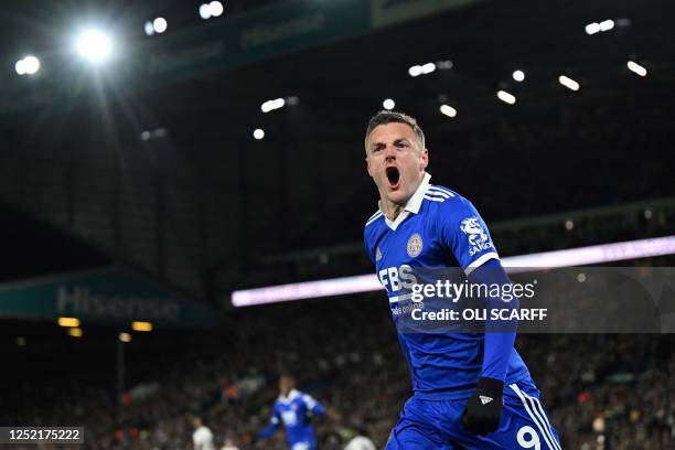 Leicester City's English striker Jamie Vardy celebrates after scoring his team first goal during the English Premier League football match between...
