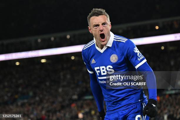 Leicester City's English striker Jamie Vardy celebrates after scoring his team first goal during the English Premier League football match between...
