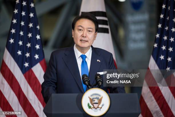 In this handout image provided by NASA, President Yoon Suk Yeol of the Republic of Korea delivers remarks during a tour of NASA's Goddard Space...