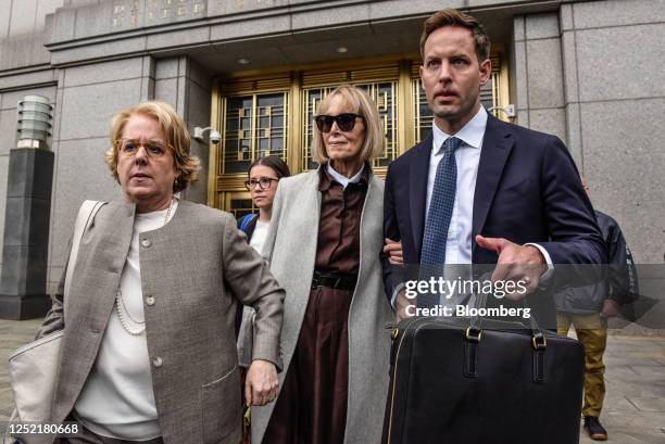 Author E. Jean Carroll, center, leaves federal court in New York, US, on Tuesday, April 25, 2023. The trial of a civil suit by New York author E....