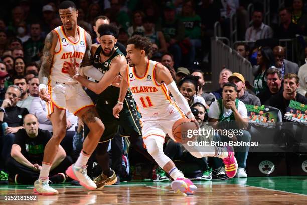 Trae Young of the Atlanta Hawks dribbles the ball during the game against the Boston Celtics during Round One Game Five of the 2023 NBA Playoffs on...