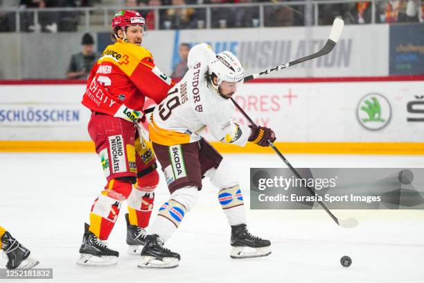 Josh Jooris of Servette against Damien Brunner of Biel during the Swiss Hockey National League Final match between Biel-Bienne and Geneve-Servette at...