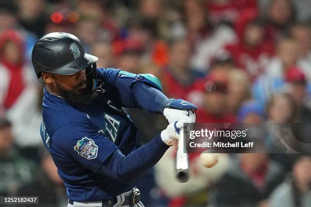 Teoscar Hernandez of the Seattle Mariners hits a two-run home run in the top of the sixth inning against the Philadelphia Phillies at Citizens Bank...