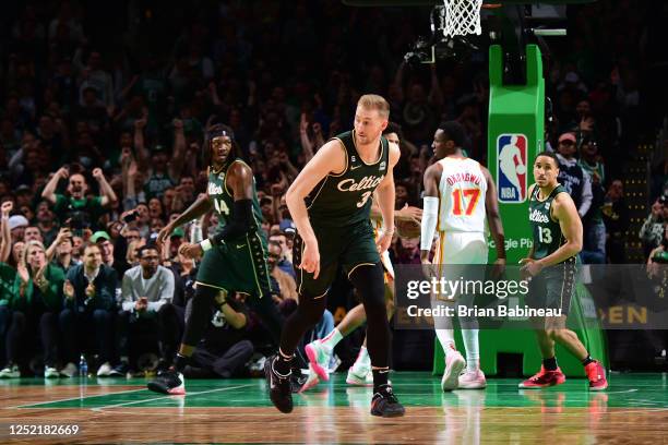 Sam Hauser of the Boston Celtics celebrates during the game against the Atlanta Hawks during Round One Game Five of the 2023 NBA Playoffs on April...