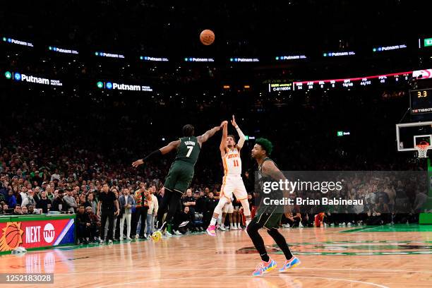 Trae Young of the Atlanta Hawks scores the game winning shot during the game against the Boston Celtics during Round One Game Five of the 2023 NBA...