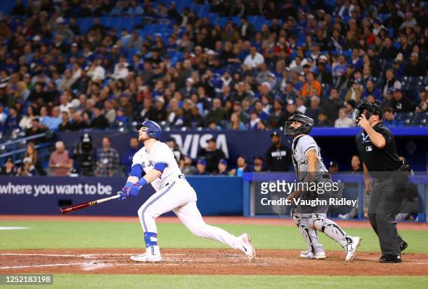 Danny Jansen of the Toronto Blue Jays flies out in the eighth inning against the Chicago White Sox at Rogers Centre on April 25, 2023 in Toronto,...