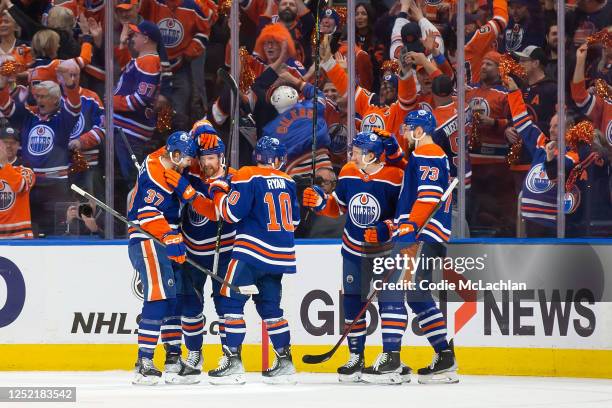 Warren Foegele, Brett Kulak, Derek Ryan, Ryan McLeod and Vincent Desharnais of the Edmonton Oilers celebrate a goal against the Los Angeles Kings...