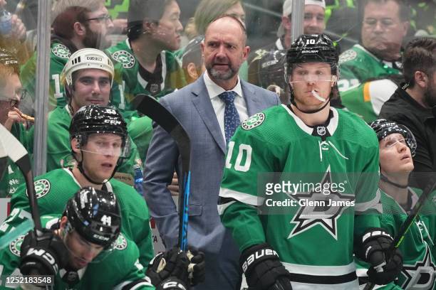 Pete DeBoer of the Dallas Stars coaches against the Minnesota Wild in Game Five of the First Round of the 2023 Stanley Cup Playoffs at American...