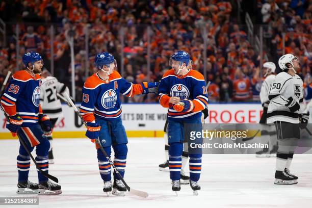 Ryan Nugent-Hopkins and Zach Hyman of the Edmonton Oilers celebrate a goal against the Los Angeles Kings during the second period in Game Five of the...