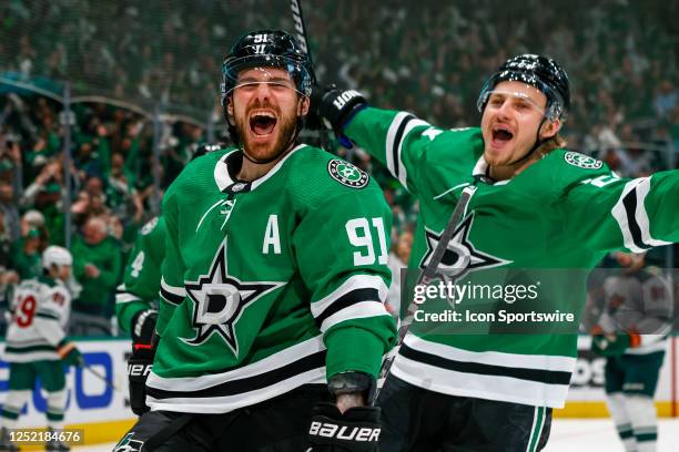 Dallas Stars center Tyler Seguin celebrates scoring a goal with center Roope Hintz during the game between the Dallas Stars and the Minnesota Wild on...