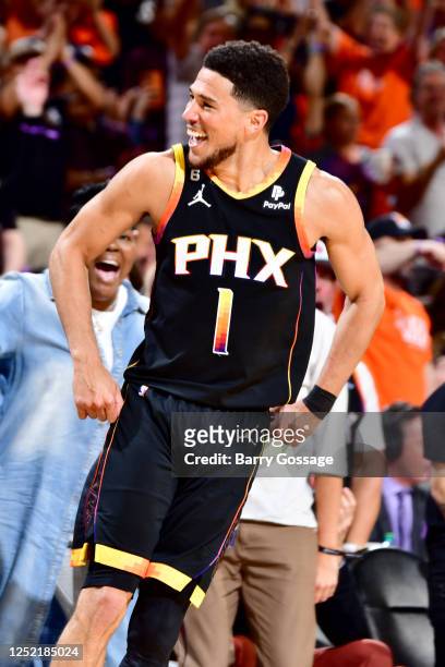 Devin Booker of the Phoenix Suns celebrates a play during the game against the LA Clippers during Round 1 Game 5 of the 2023 NBA Playoffs on April...