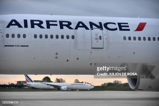 Air France planes arrive at Roissy-Charles-de-Gaulle airport in Roissy-en-France, near Paris, on April 26, 2023.