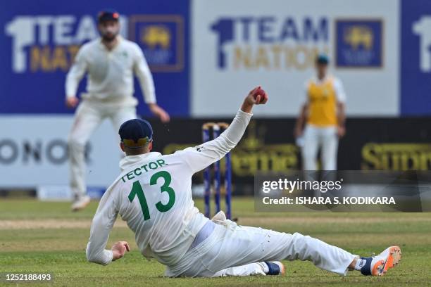 Ireland's Harry Tector fields a ball during third day of the second and final cricket Test match between Sri Lanka and Ireland at the Galle...