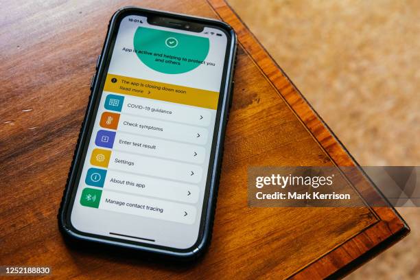 Mobile phone displays the NHS Covid-19 Test and Trace app on 25 April 2023 in Windsor, United Kingdom. Alerts from the contact-tracing app for...