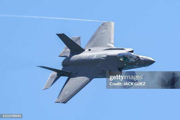 An Israeli Air Force F-35 Lightning II fighter aircraft flies over during an air show in Tel Aviv on April 26 as Israel marks Independence Day , 75...