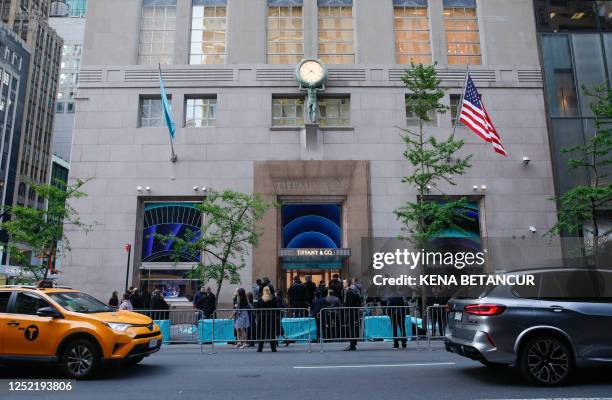 Outside view of the Tiffany & Co ribbon-cutting ceremony for Tiffany's flagship store in New York, April 26, 2023.