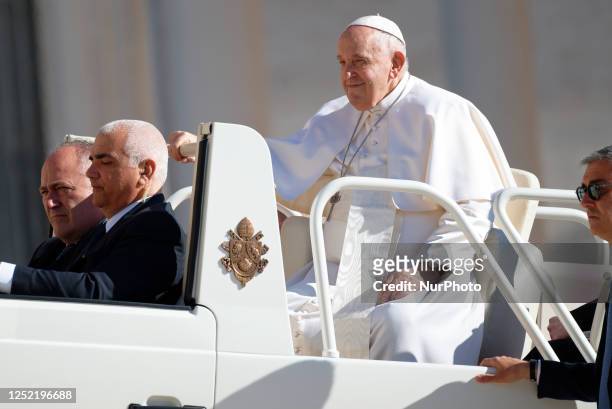 Pope Francis attends his weekly general audience in St. Peter's Square at The Vatican, Wednesday, April 26, 2023.