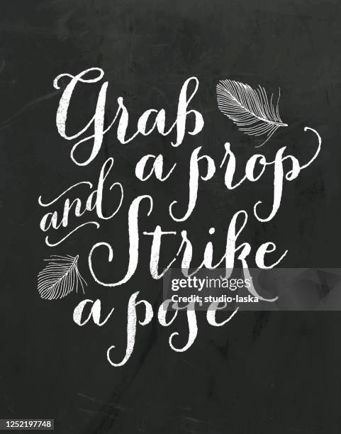 photo booth sign. grab a prop and strike a pose. vintage wedding chalkboard sign with a hand drawn feather illustration. - photomaton stock illustrations